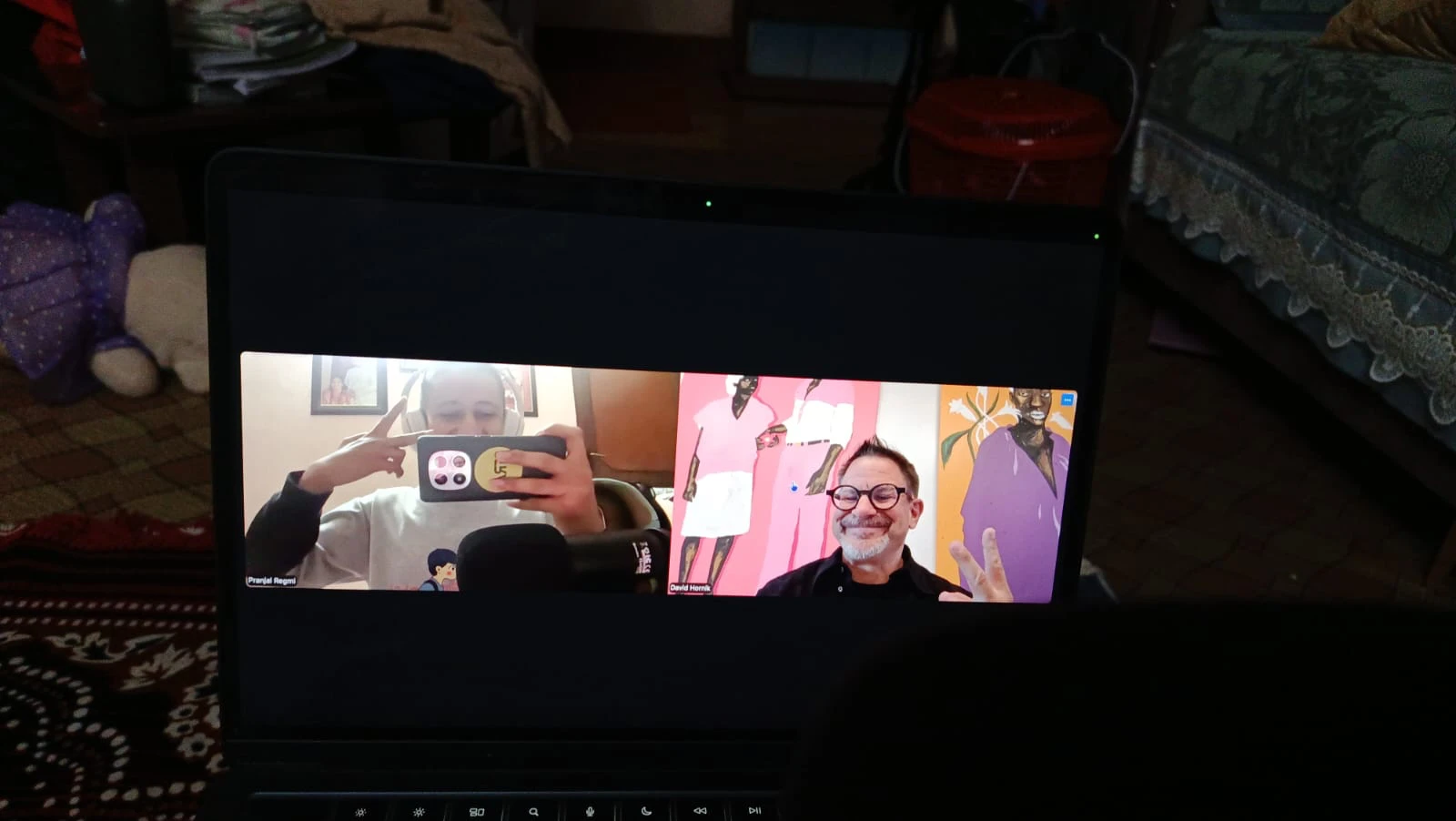 Codezen Regmi and David Hornik waving on a video call